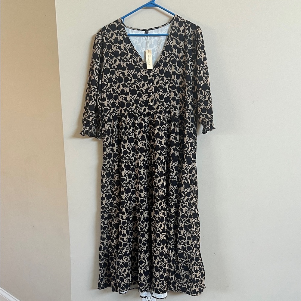 Elegant Black and Cream Floral Dress